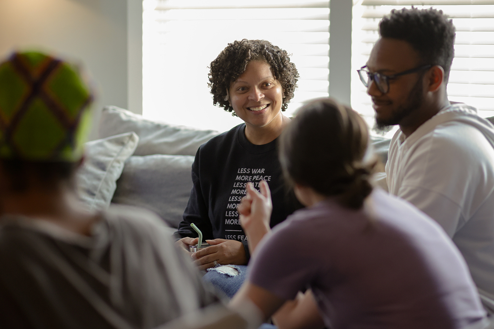 Transformation Church Care Team members talking and offering support in a comfortable setting.